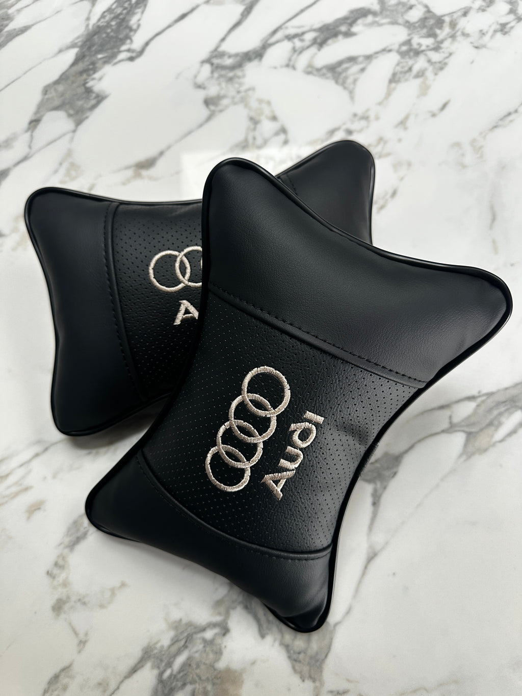 Black car headrest cushions for BMW Mercedes and Audi interiors